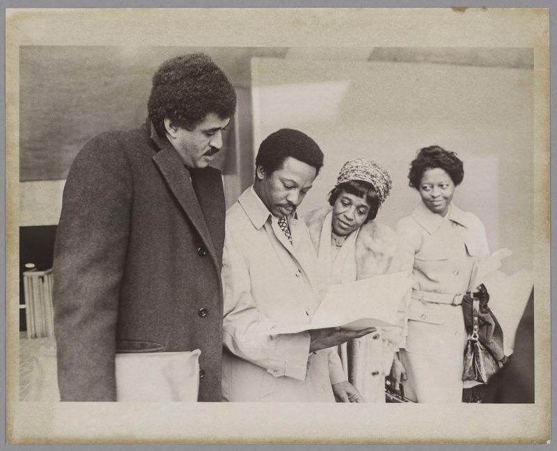 Clarence G. Williams with educators at conference, 1970s